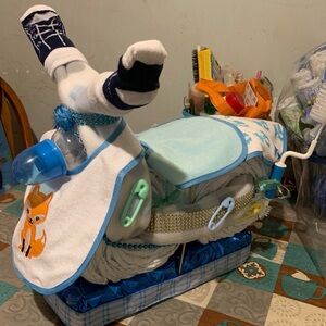 Diaper delights, this is obviously for a boy any color any theme I’m your girl